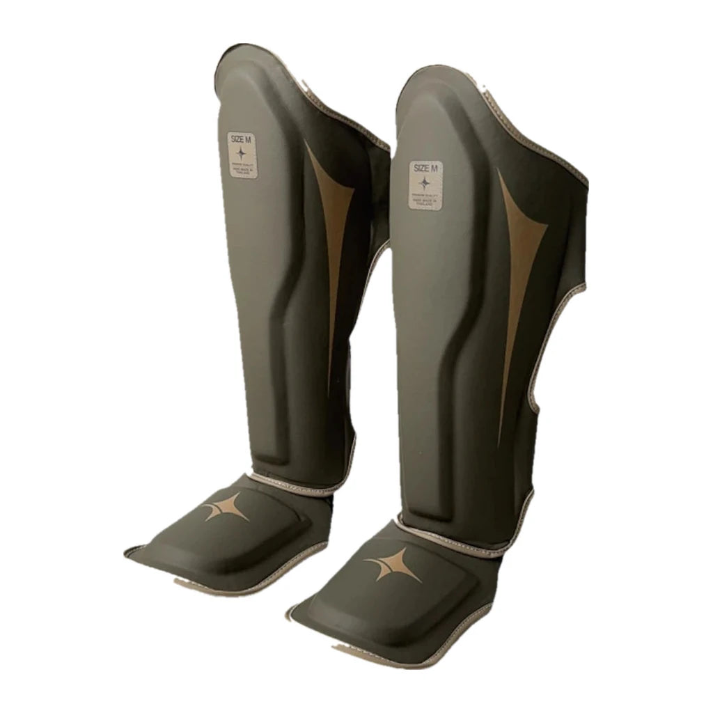 NYT Muay Thai Shin Guards Smoke/Sand, front studio view
