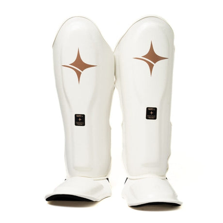 NYT Muay Thai Shin Guards White, studio product view with natural shading